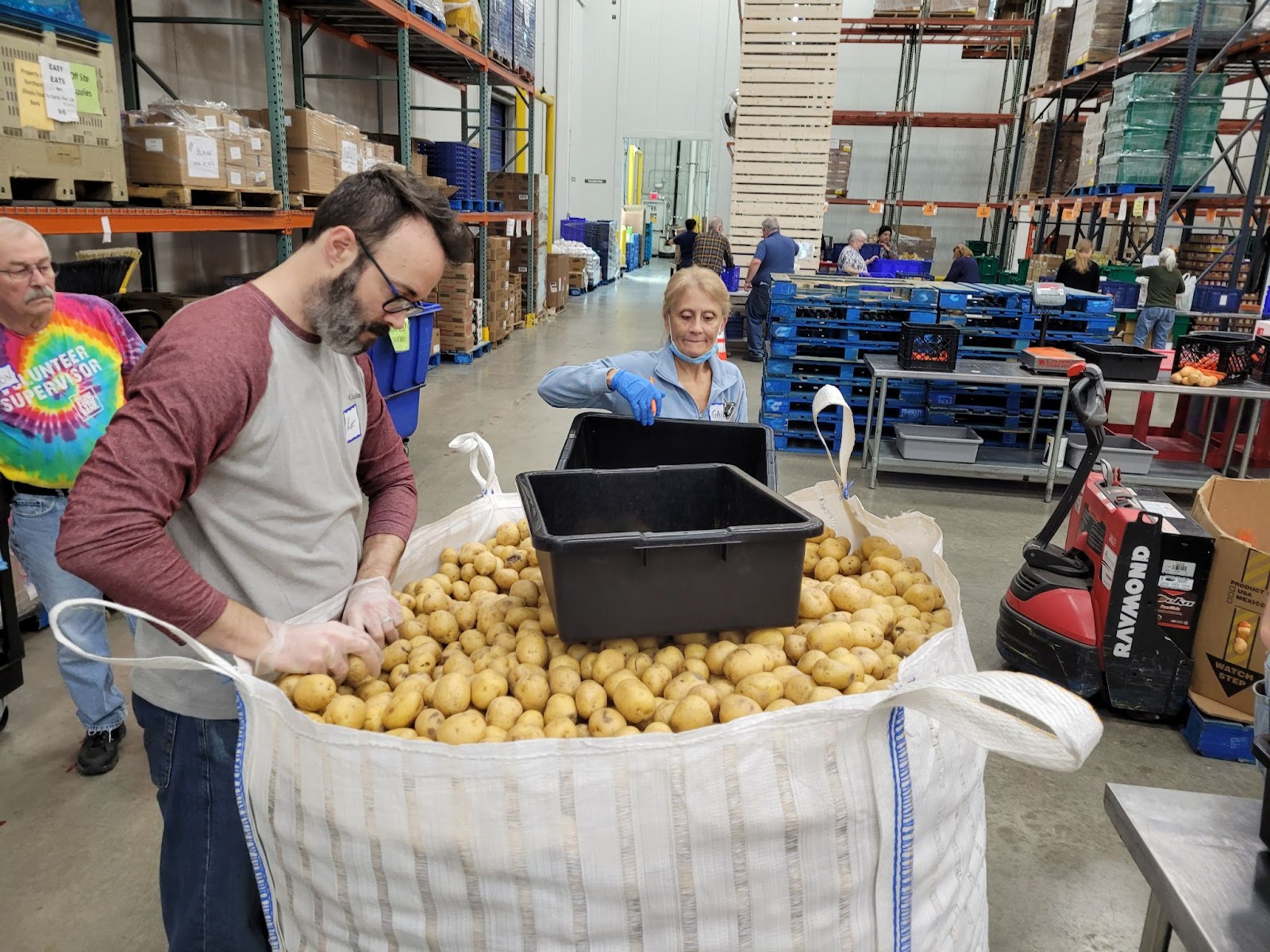 Kurt and Gail working away at potatoes.